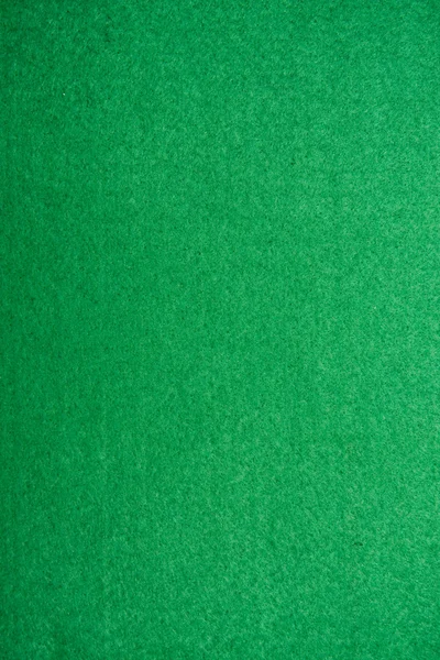 Póker asztal érezte háttér zöld színű — Stock Fotó