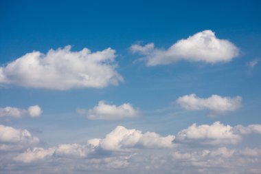 Clouds on a blue sky clipart