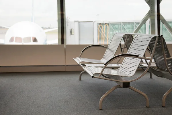 Empty chairs at airport — Stock Photo, Image