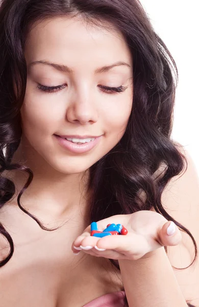 Mulher tomando pílulas — Fotografia de Stock