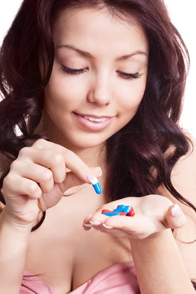 Kvinna ta piller — Stockfoto