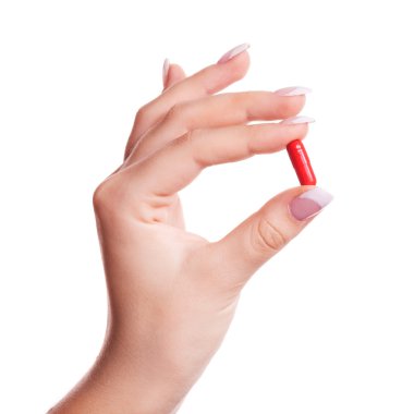 Hand with a pill clipart