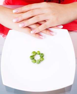 Woman eating peas clipart