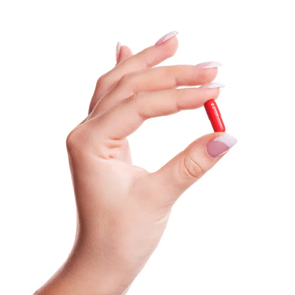 Mão com um comprimido — Fotografia de Stock
