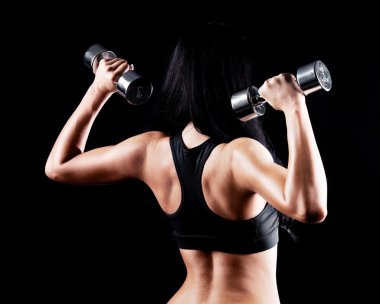 Woman with dumbbells clipart