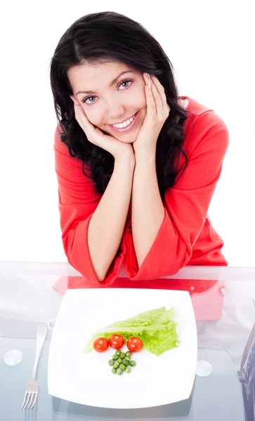 Donna che mangia verdure — Foto Stock