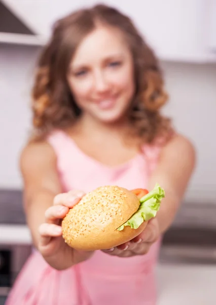 Woman with sandwich Royalty Free Stock Images