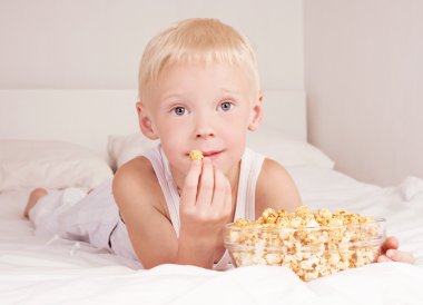 Child with popcorn clipart