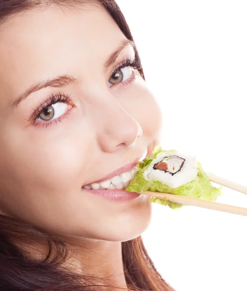 Жінка їдять суші — стокове фото