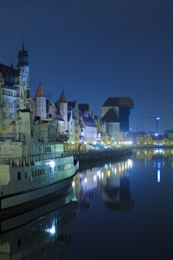 Historic Polish city of Gdansk at night clipart