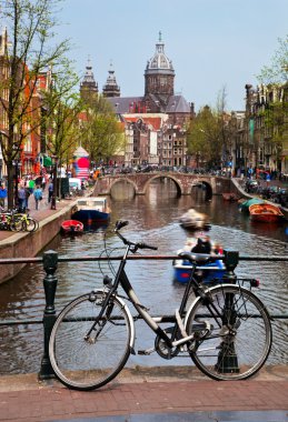 Amsterdam old town canal, boats. clipart