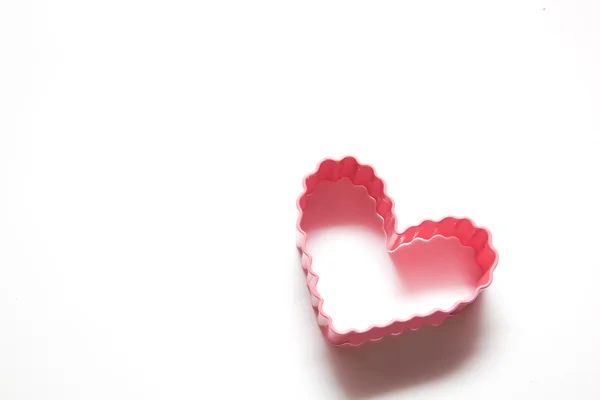 Una semplice forma di cuore su sfondo bianco — Foto Stock