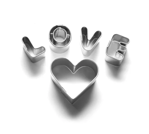 Aşk mesajı ve kalp yapılan krom harf — Stok fotoğraf
