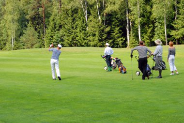 Group of Golfers at Country Club clipart