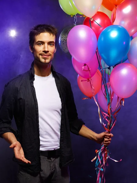 Guy with balloons — Stock Photo, Image