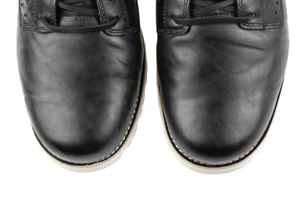 Hombres botas de invierno de cuero negro aisladas sobre fondo blanco — Foto de Stock