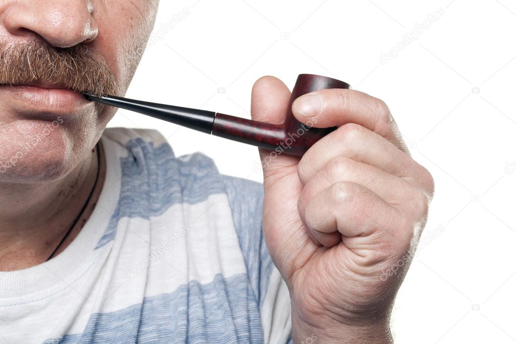 Mature caucasian man holding smoking pipe in hand isolated on white backgro