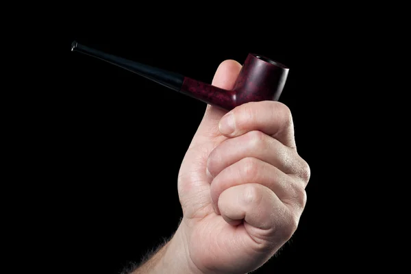 Κάπνισμα σωλήνα στο χέρι απομονώνονται σε μαύρο φόντο — Φωτογραφία Αρχείου