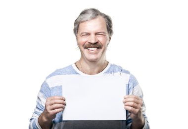 Mature man holding a blank billboard isolated on white background clipart