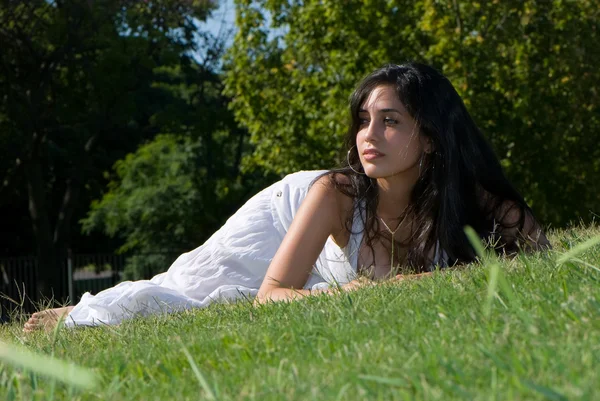 Relaxing girl on meadow — Stock Photo, Image