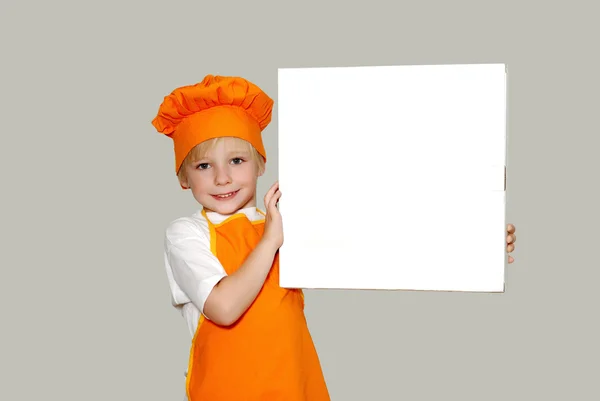 Портрет маленького кухаря з коробкою для піци — стокове фото