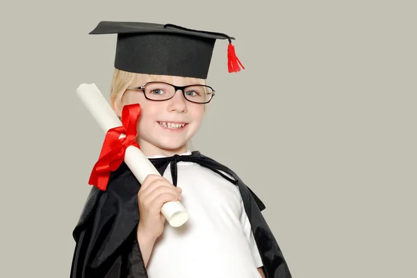 Schoolboy in graduation cap isolated — Stock Photo, Image