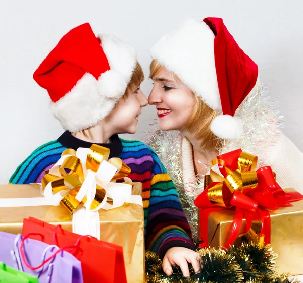 Happy family with a gifts — Stock Photo, Image