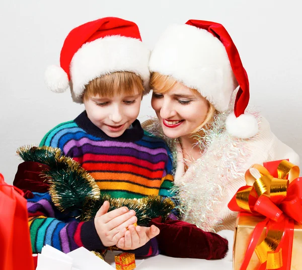 Happy family with a gifts — Stock Photo, Image