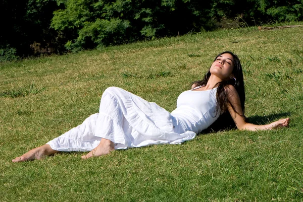Relaxing girl on meadow — Stock Photo, Image