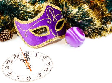 Decoration with a clock, christmas balls and Venetian mask clipart