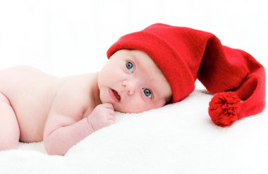 Cute newborn baby in a hat clipart