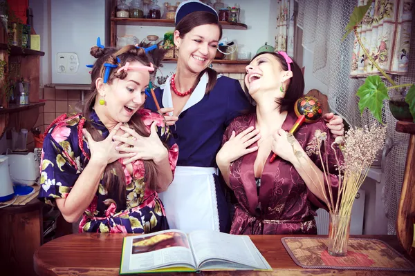 Portrait of three cheerful housewives — Stock Photo, Image