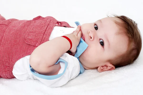 Αξιολάτρευτο μωρό σε λευκό φόντο — Φωτογραφία Αρχείου