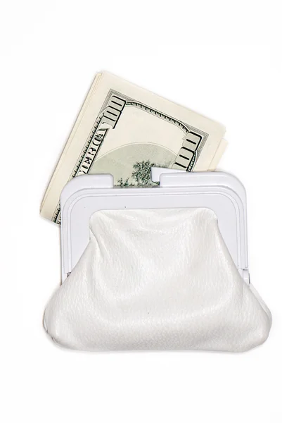 Dólares em uma bolsa em um fundo leve — Fotografia de Stock