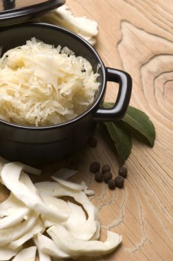 Fresh pickled cabbage - traditional polish sauerkraut clipart