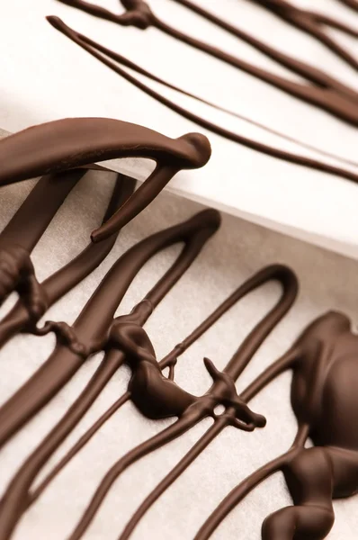 Chocolade sporen op een Witboek — Stockfoto