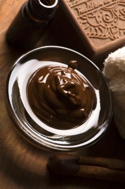 Chocolate spa with cinnamon clipart