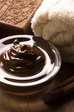 Chocolate spa with cinnamon clipart