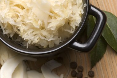 Fresh pickled cabbage - traditional polish sauerkraut clipart