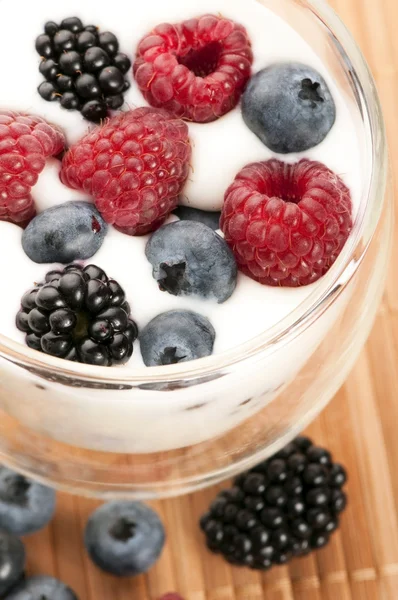 stock image Yogurt with blueberries, raspberries and blackberries