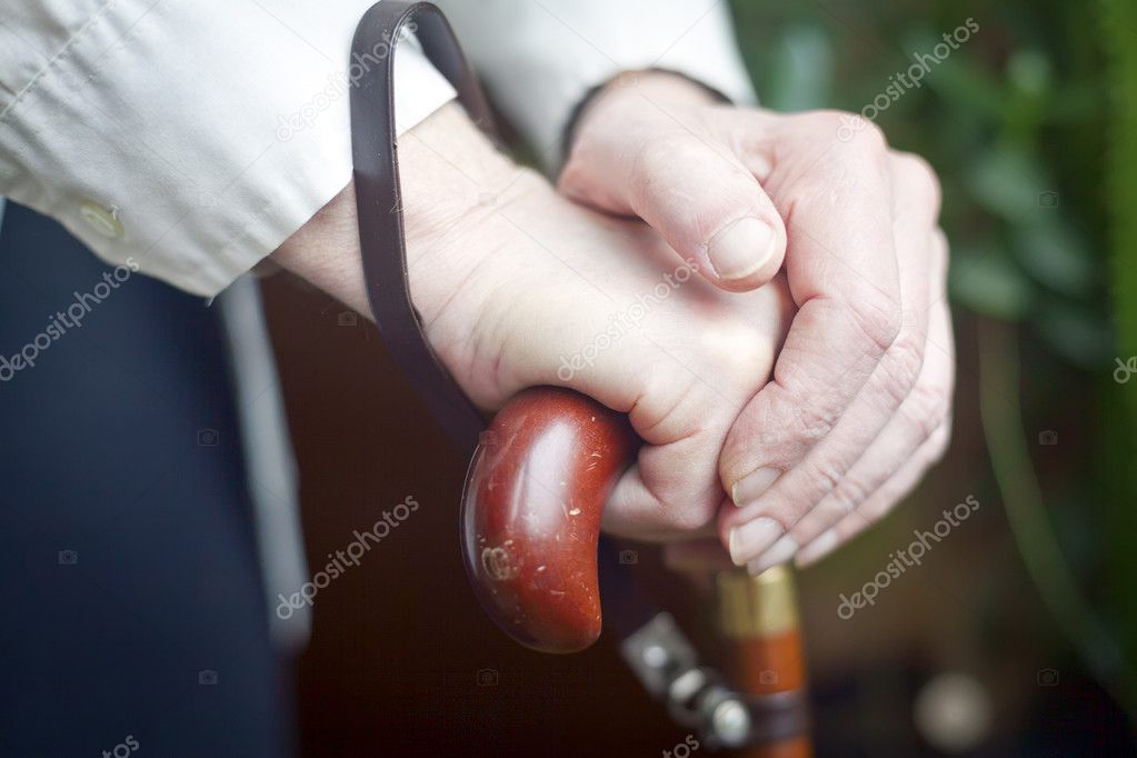 Hands Holding Cane