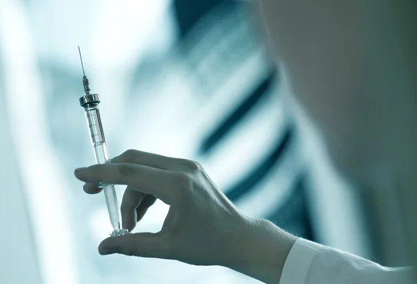 Syringe in a hand close up shot — Stock Photo, Image