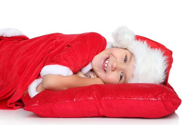 Portrait of happy little girl in santa claus clothes — Stock Photo, Image