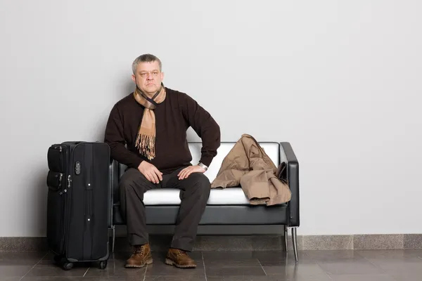 Thoughtful man in the waiting hall. — Stock Photo, Image