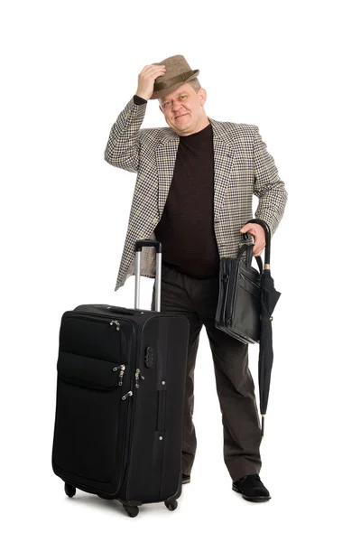 Smiling man takes off his hat in greeting — Stock Photo, Image