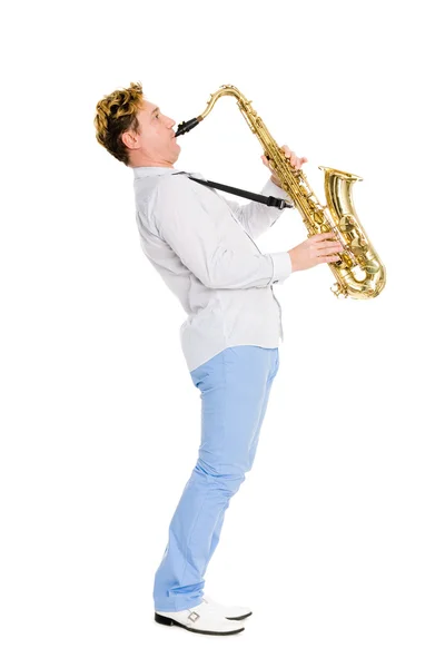 Mladý hudebník hraje na saxofon — Stock fotografie