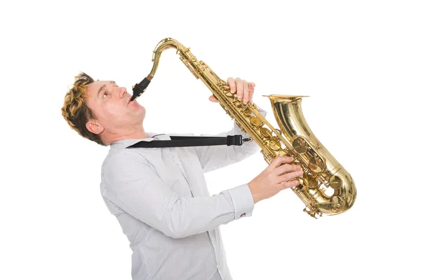 Jonge muzikant speelt de saxofoon — Stockfoto