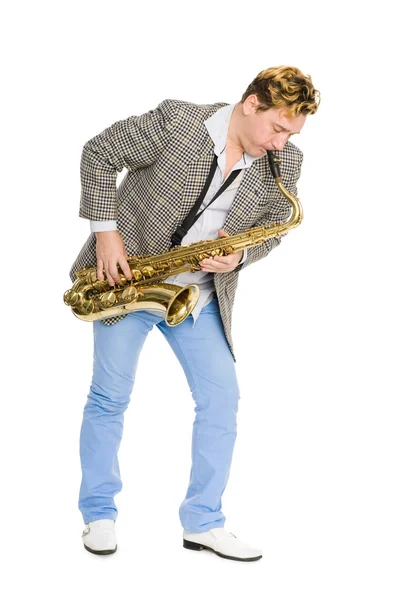 Mladý hudebník hraje na saxofon. — Stock fotografie