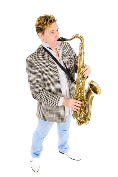 Mladý muž hraje saxofon — Stock fotografie