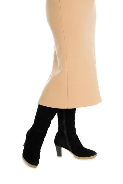 Elegant women's skirt and suede boots. — Stock Photo, Image
